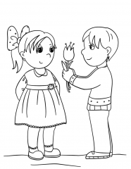 Мальчик дарит цветок